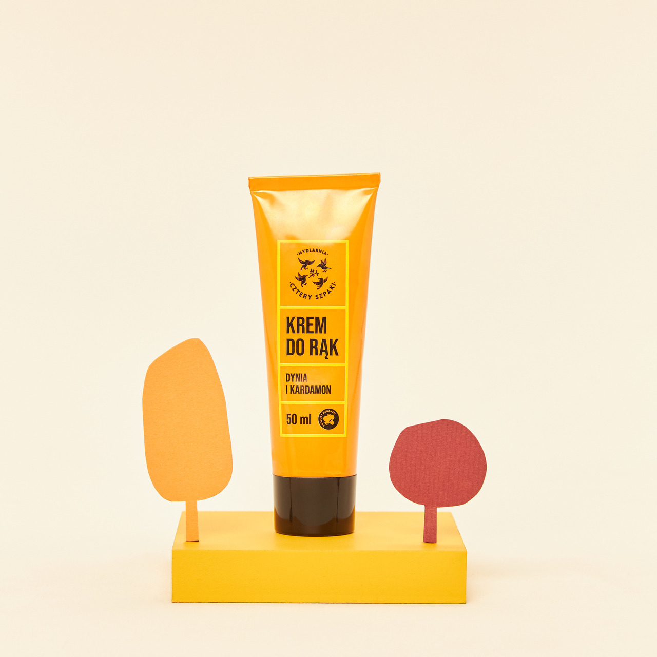 南瓜小荳蔻深度修護護手霜,50ml 橘色管狀包裝,針對粗糙與乾裂肌膚提供強力保護。