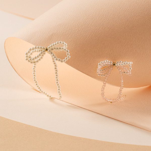 淡雅珍珠雙層蝴蝶結耳環