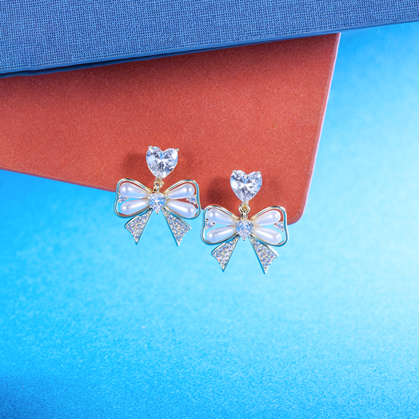甜美珍珠蝴蝶結耳環