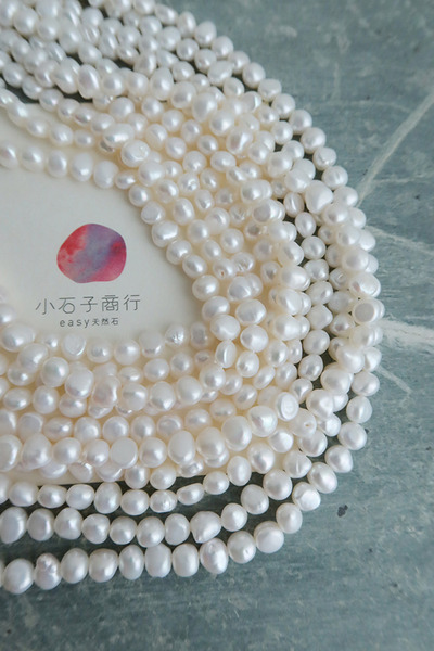 淡水珍珠-不定型(白色)約6x7mm(扁形)