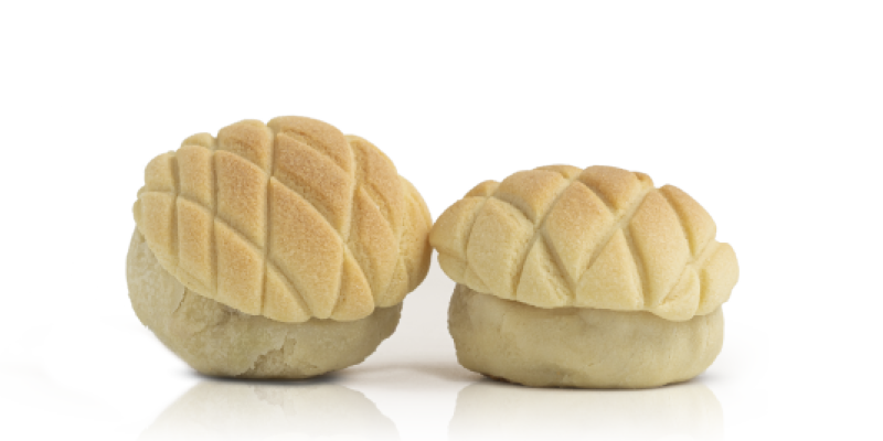 外型像迷你菠蘿麵包，小巧可愛，裡頭則包裹著滿滿的蜜芋餡。